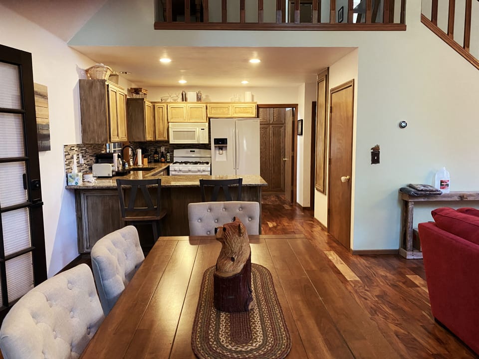 Dining area towards kitchen.