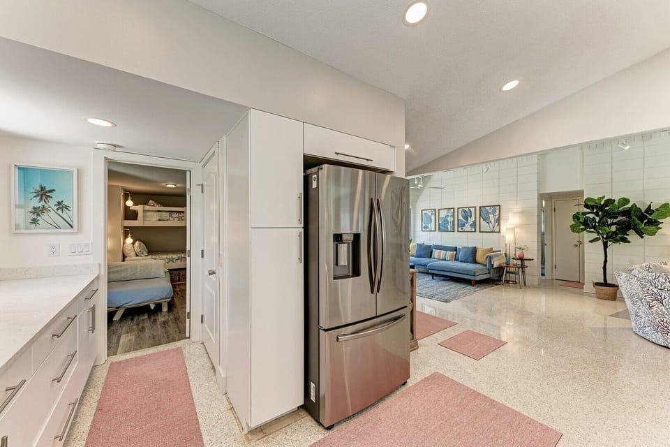 One More Day views of the kitchen with views of the living room
