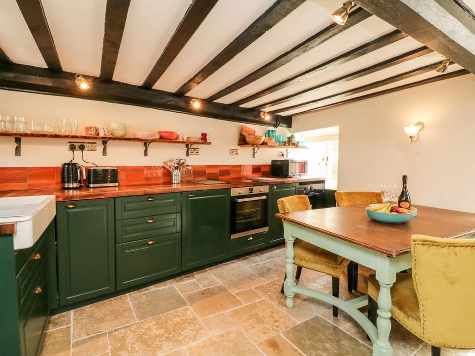 Cottage | Private kitchen | Fridge, microwave, cookware/dishes/utensils