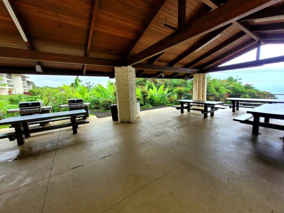 Picnic tables available beside the pool area