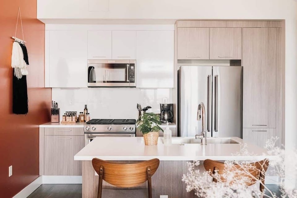 Kitchen with island and bar seating