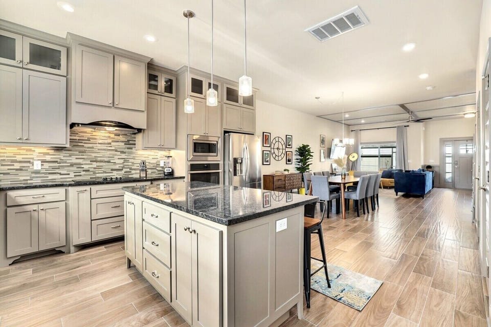 This custom kitchen is a dream, with high end appliances and luxury finishes.