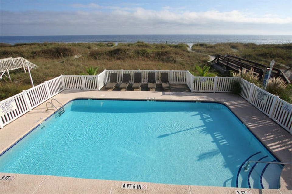 Take a cool dip in the pool after a fun day at the beach.