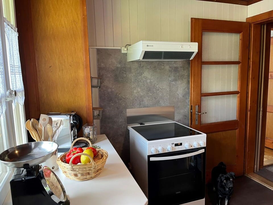 Cabinetry, Property, Food, Kitchen Appliance, Wood, Kitchen, Kitchen Stove, Home Appliance, Floor, Curtain