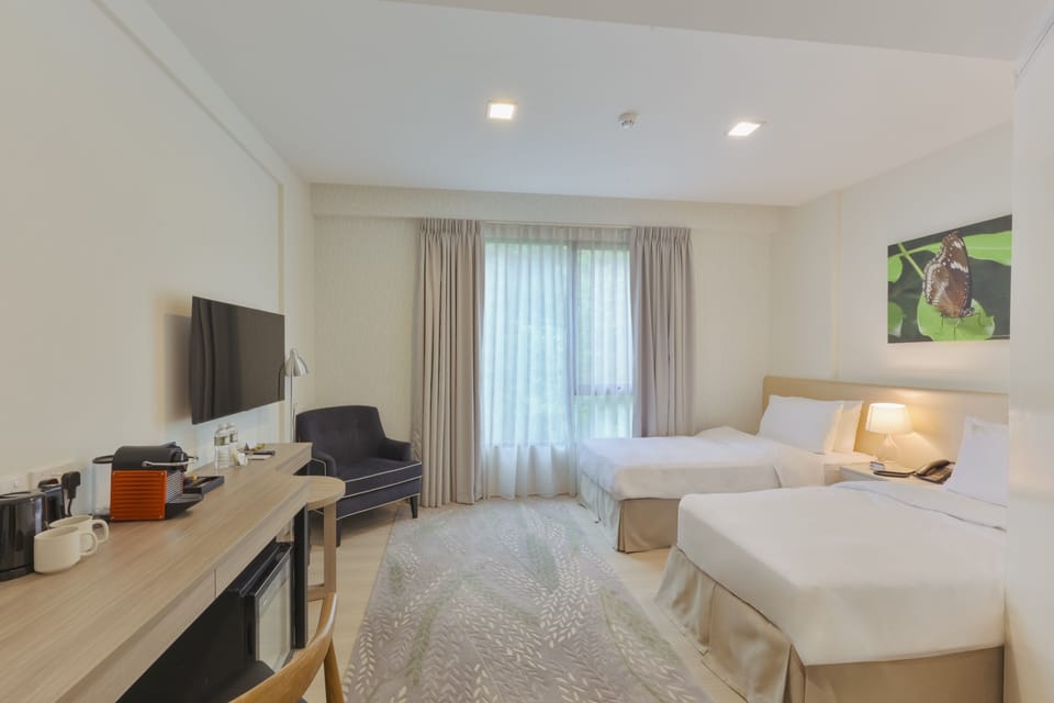 Standard Twin Room | In-room safe, desk, laptop workspace, blackout drapes