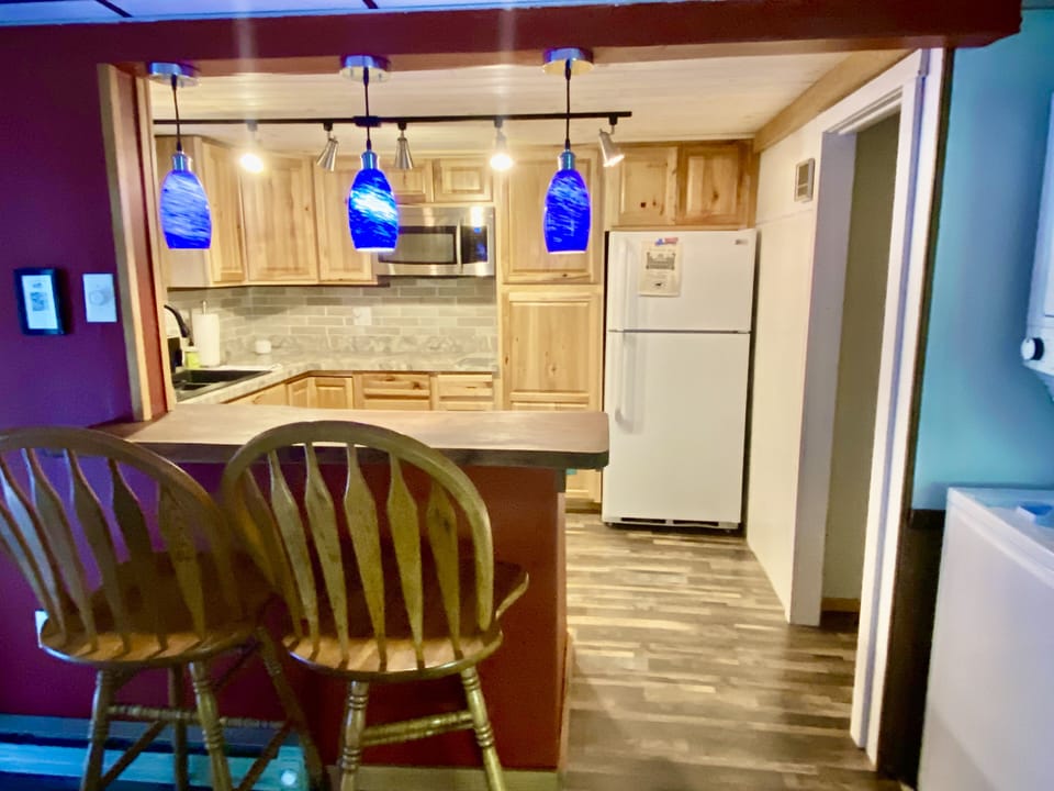 Kitchen with small breakfast bar