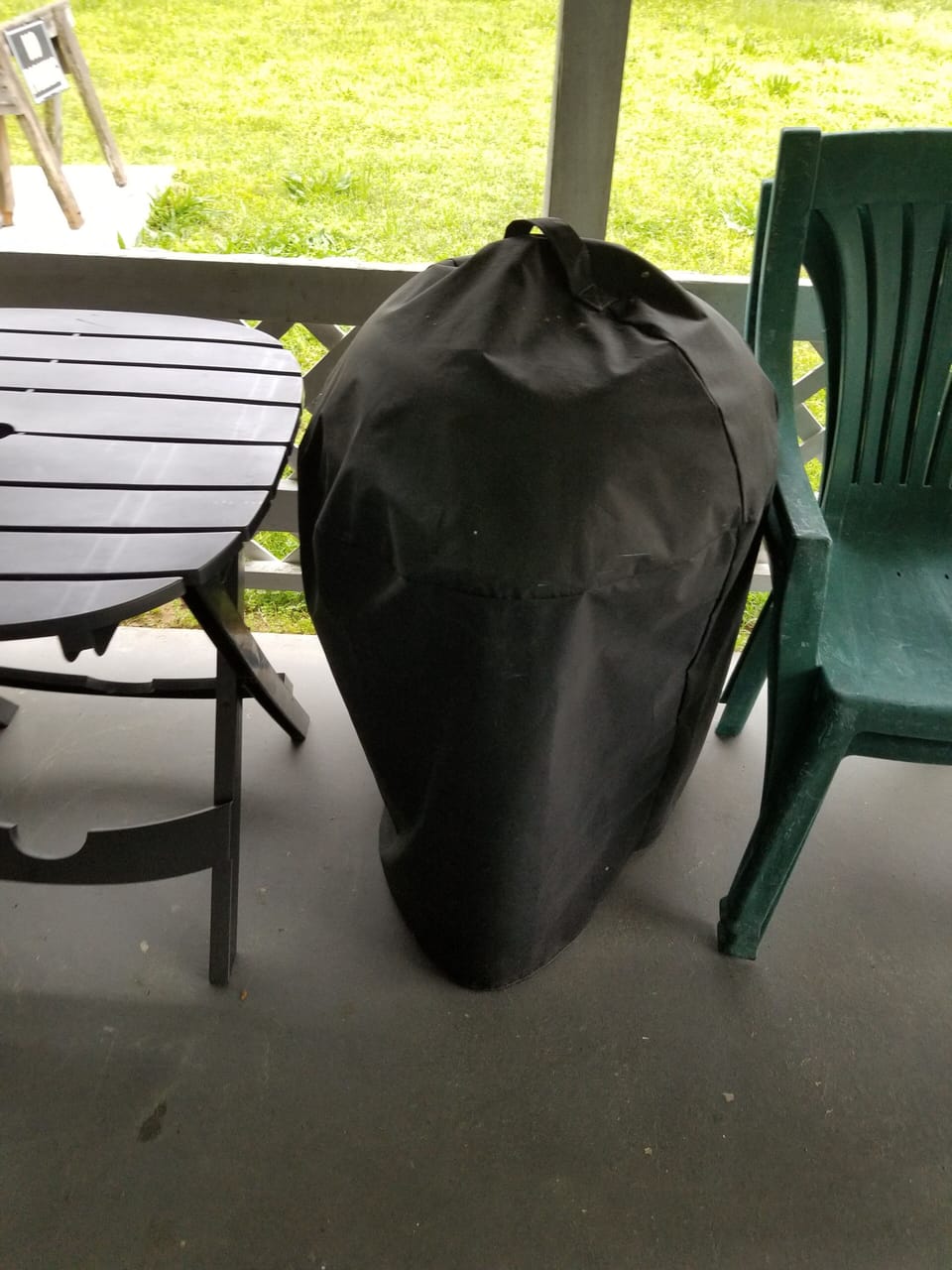 bbq grill and outside seating with table