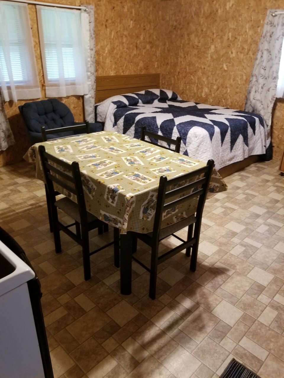 queen bed/ kitchen/ living area