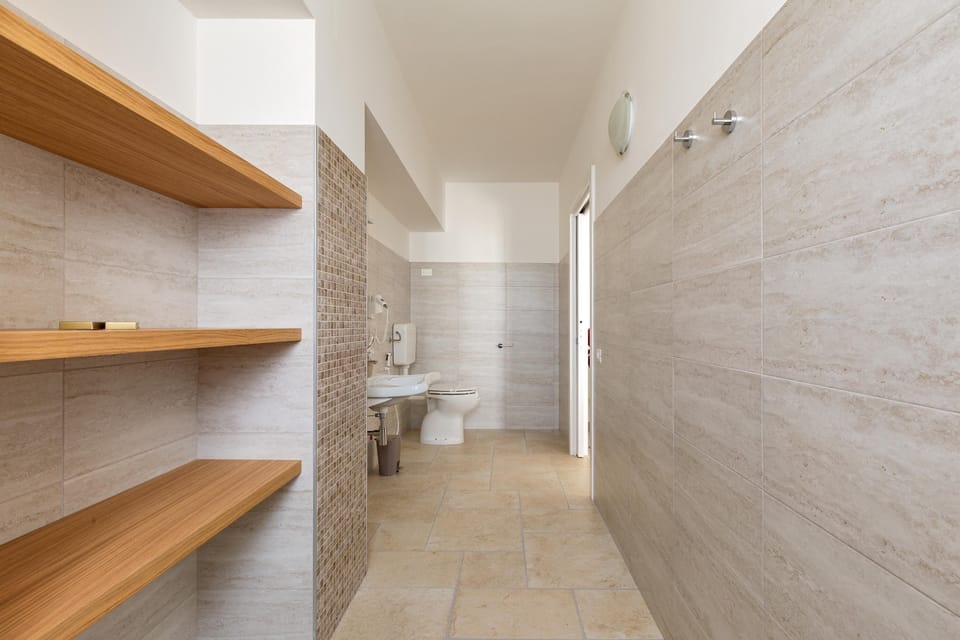 Quadruple Room | Bathroom | Shower, hair dryer
