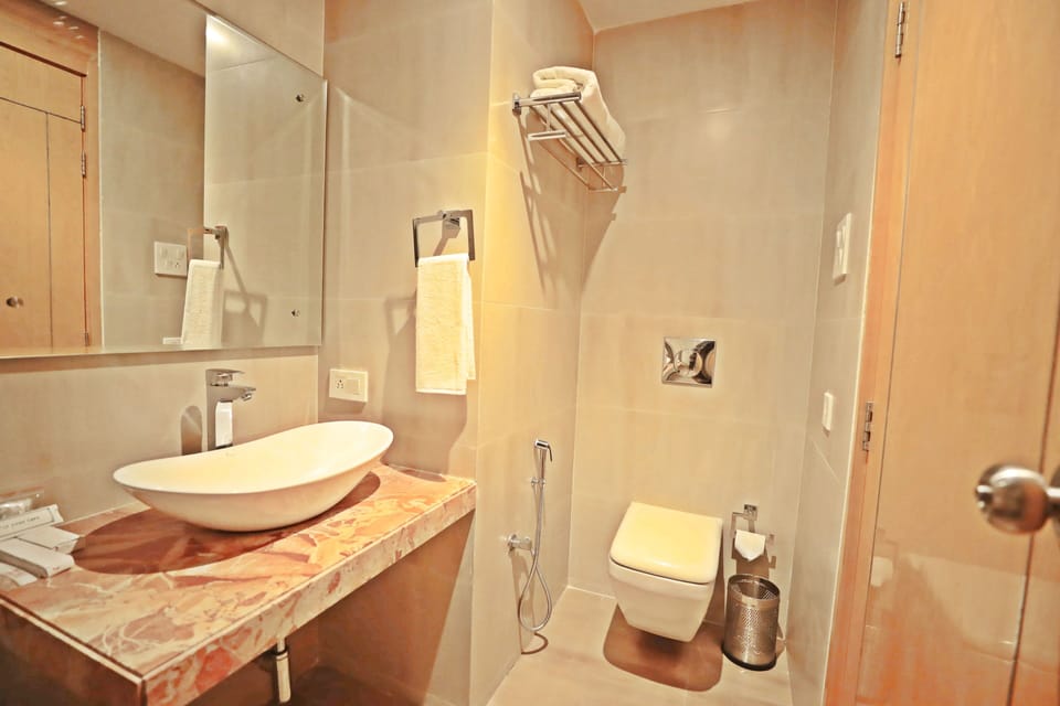 Shower, free toiletries, slippers, towels