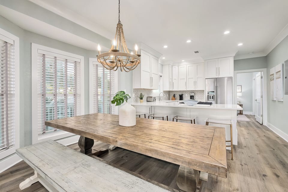 Beautiful wooden dining table with bench seating.
