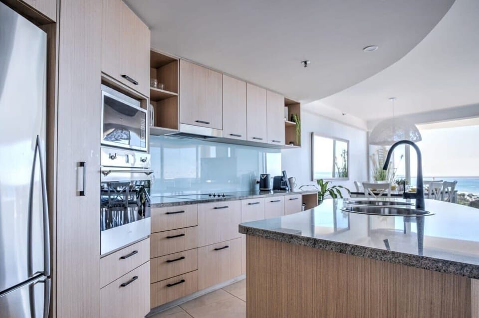 A fully equipped kitchen with modern appliances.