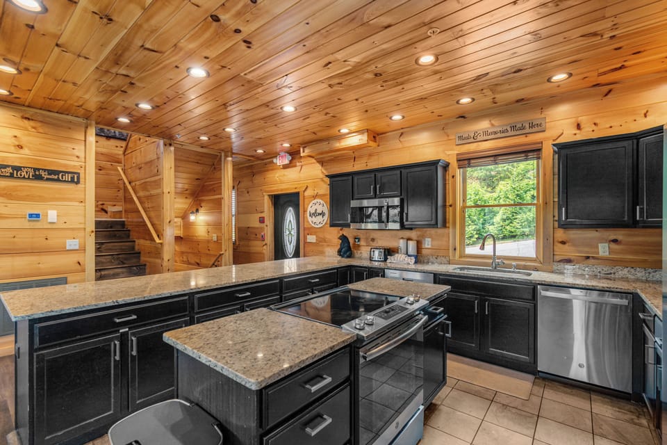 Fully equipped kitchen with stainless appliances