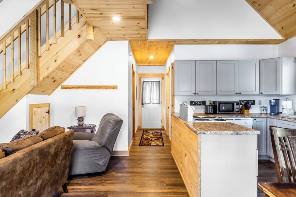 Fully equipped kitchen open to living room
