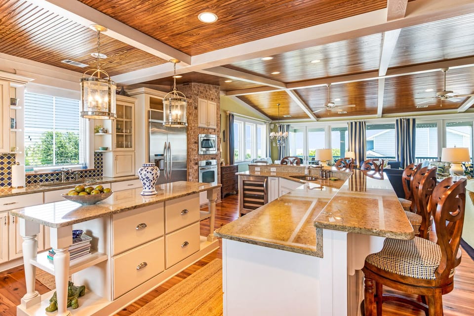 Large kitchen on the top floor with extra seating at the bar