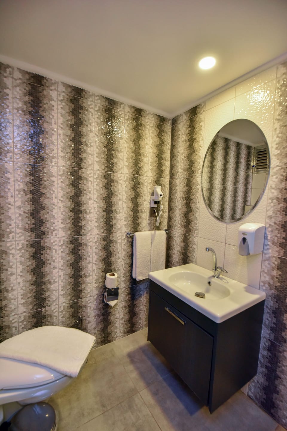 Shower, free toiletries, hair dryer, slippers