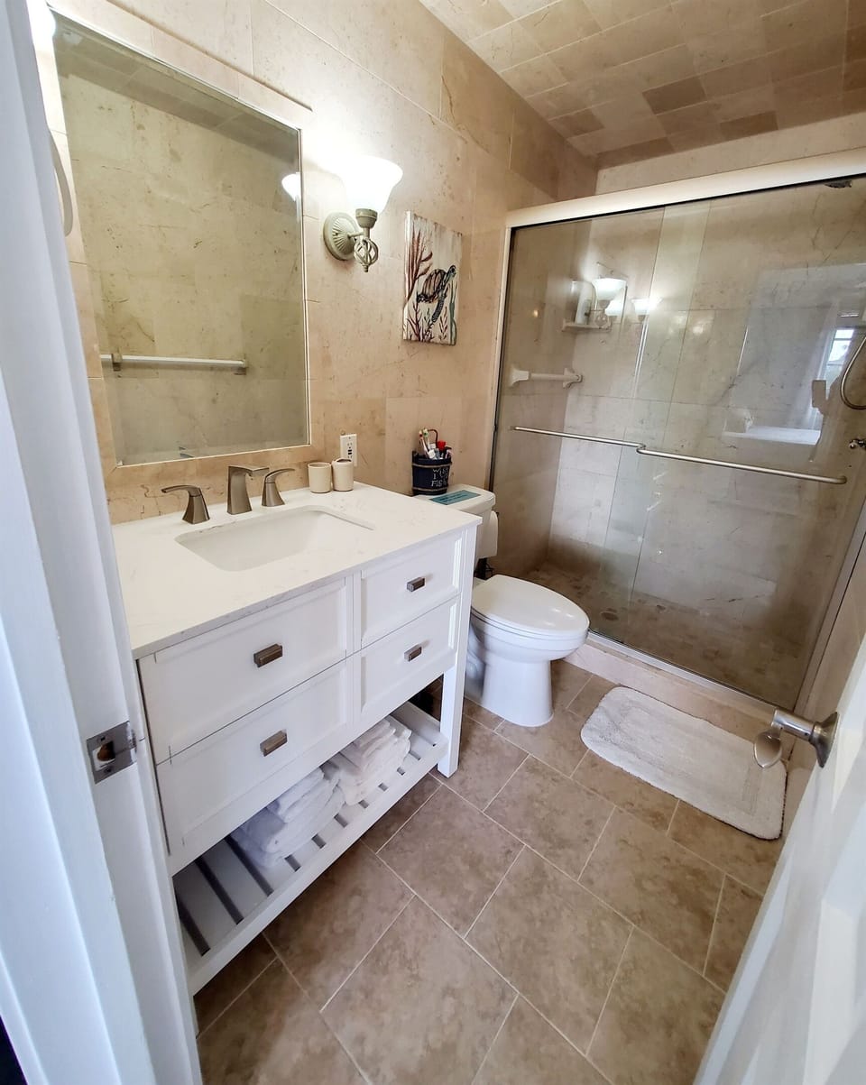 Master bath with spacious walk in shower.