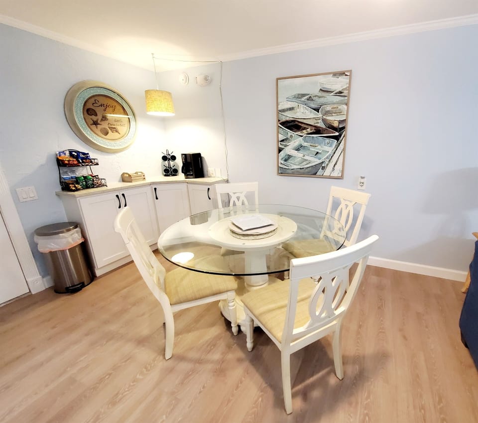 Coffee bar with both drip and Keurig coffee makers. Starter snacks provided.