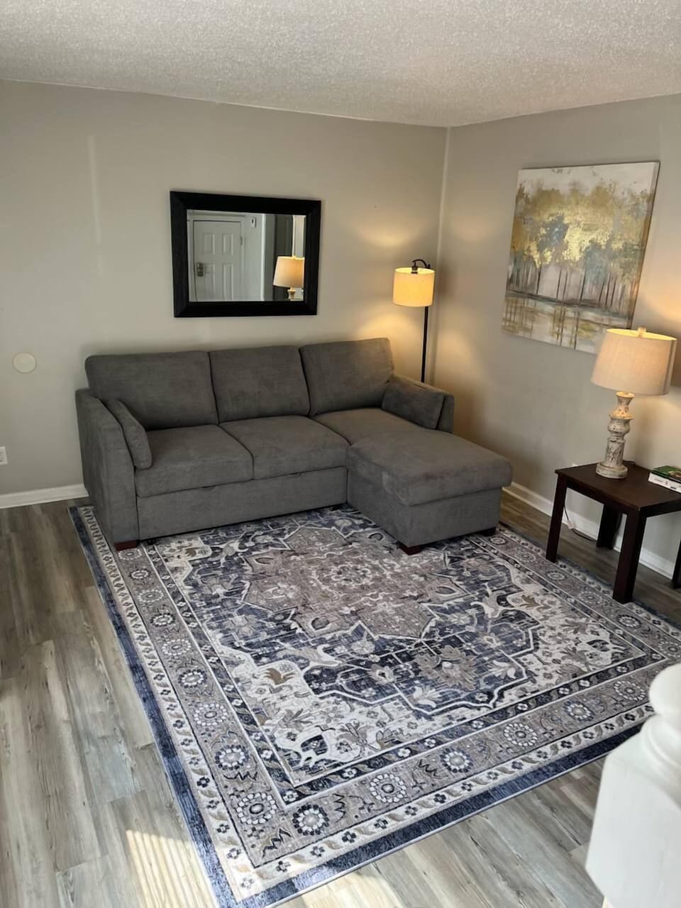 Cozy living area that also turns into a full size bed! Large tv to watch your favorite shows!