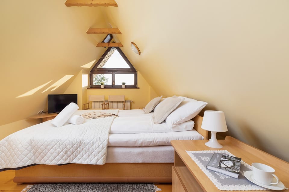 Comfortable double bed in the bedroom. 