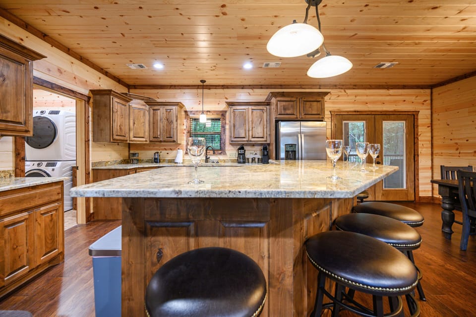 The fully stocked chef’s kitchen makes cooking for large groups easy.