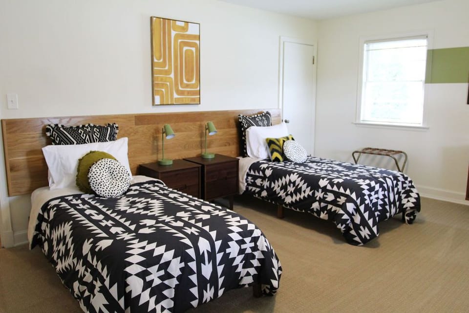 Bedroom 1 & 2 have 2 twin beds that can be arranged to make a king w/ bedding