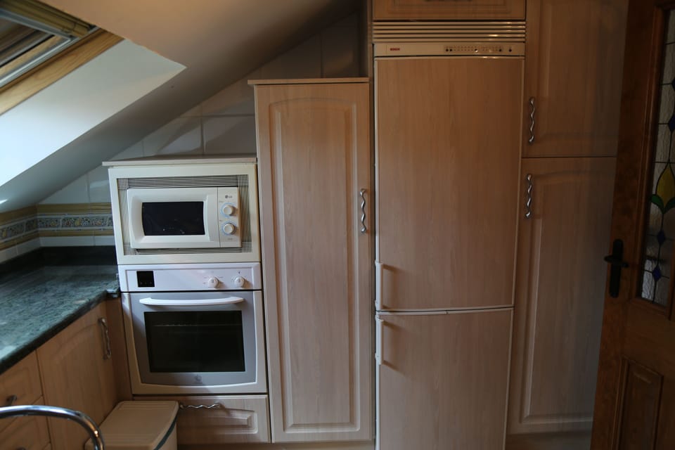 Family Quadruple Room | Private kitchen | Shared fridge, microwave