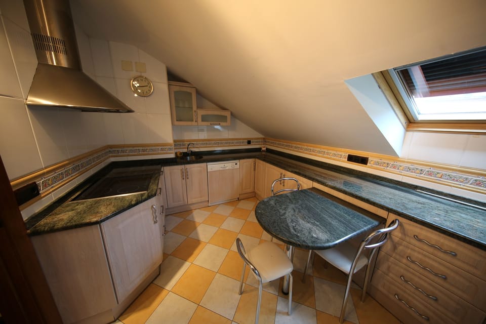 Family Quadruple Room | Private kitchen | Shared fridge, microwave