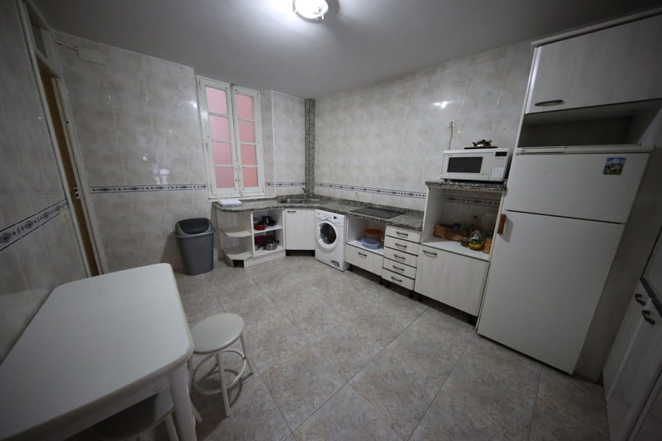 Fridge, microwave, stovetop, cookware/dishes/utensils