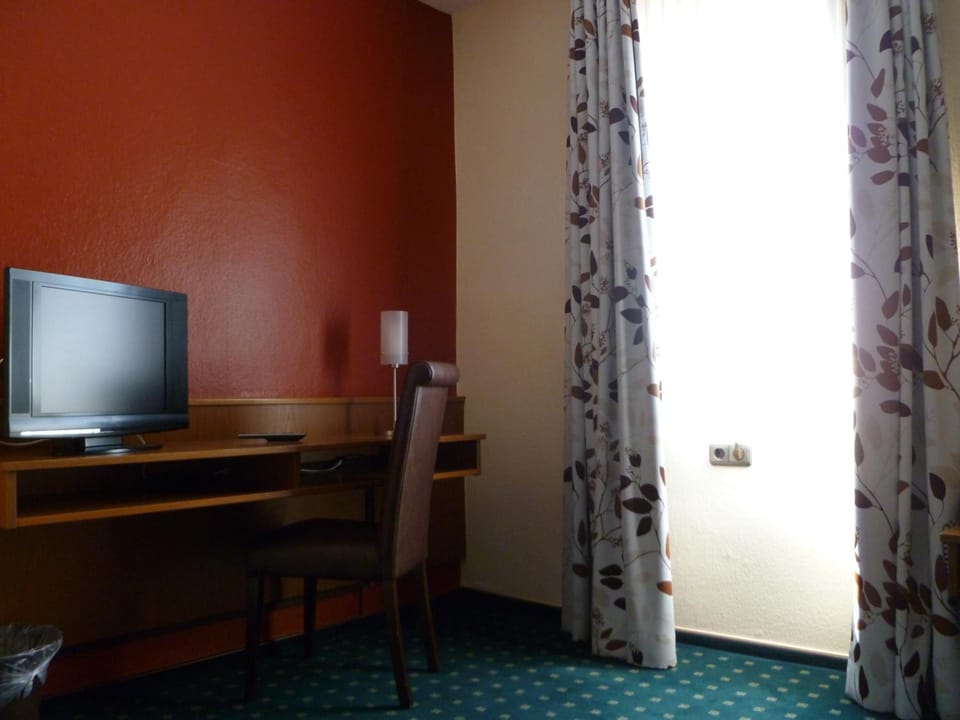 Desk, blackout drapes, soundproofing, free cribs/infant beds