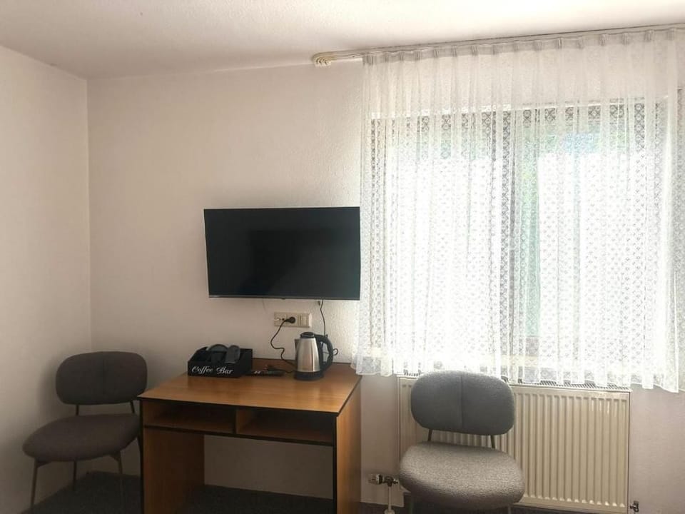 Desk, WiFi (free), bed sheets