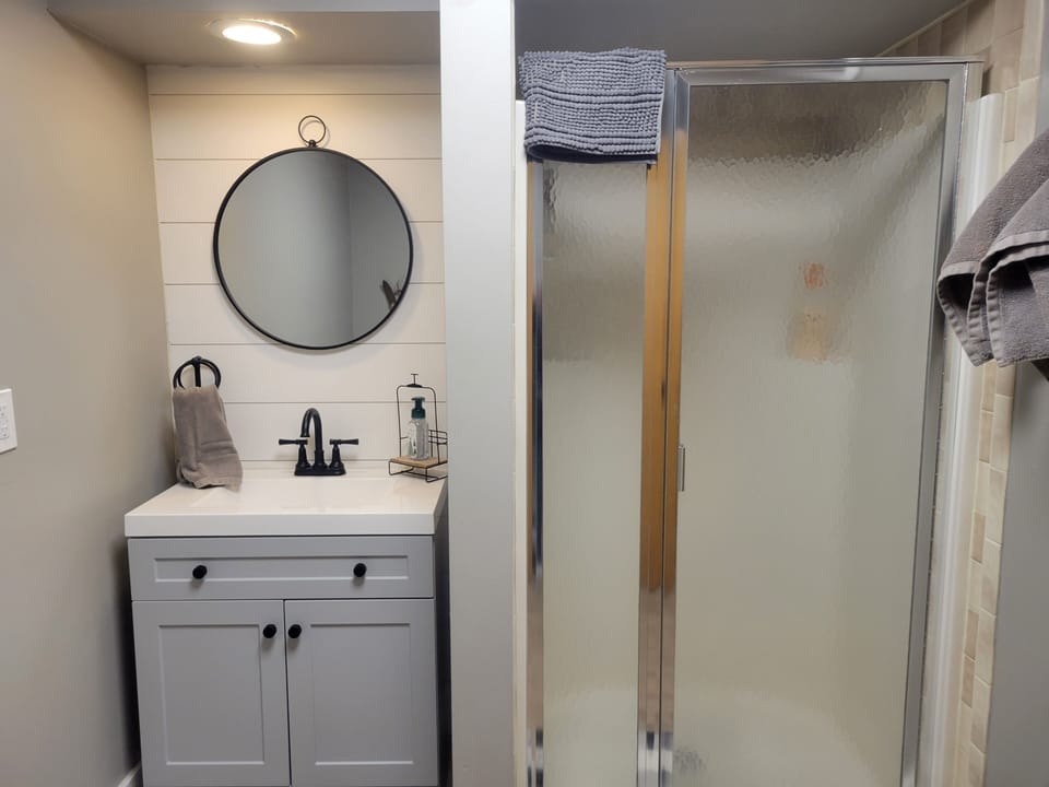 Lower level bathroom with shower.
