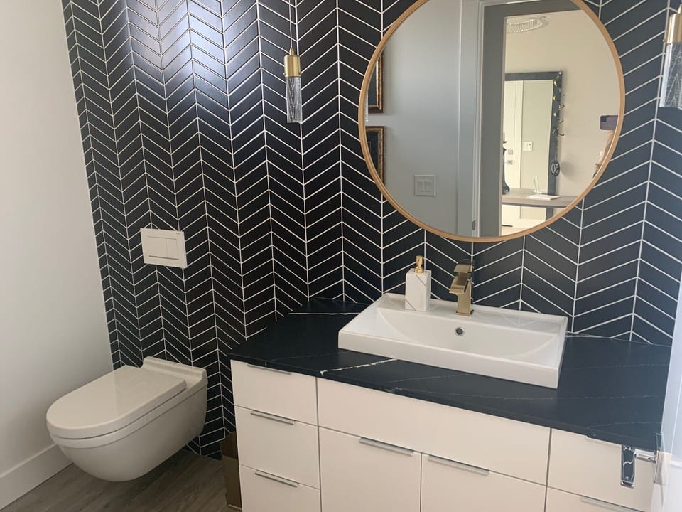 Powder room near front door. 