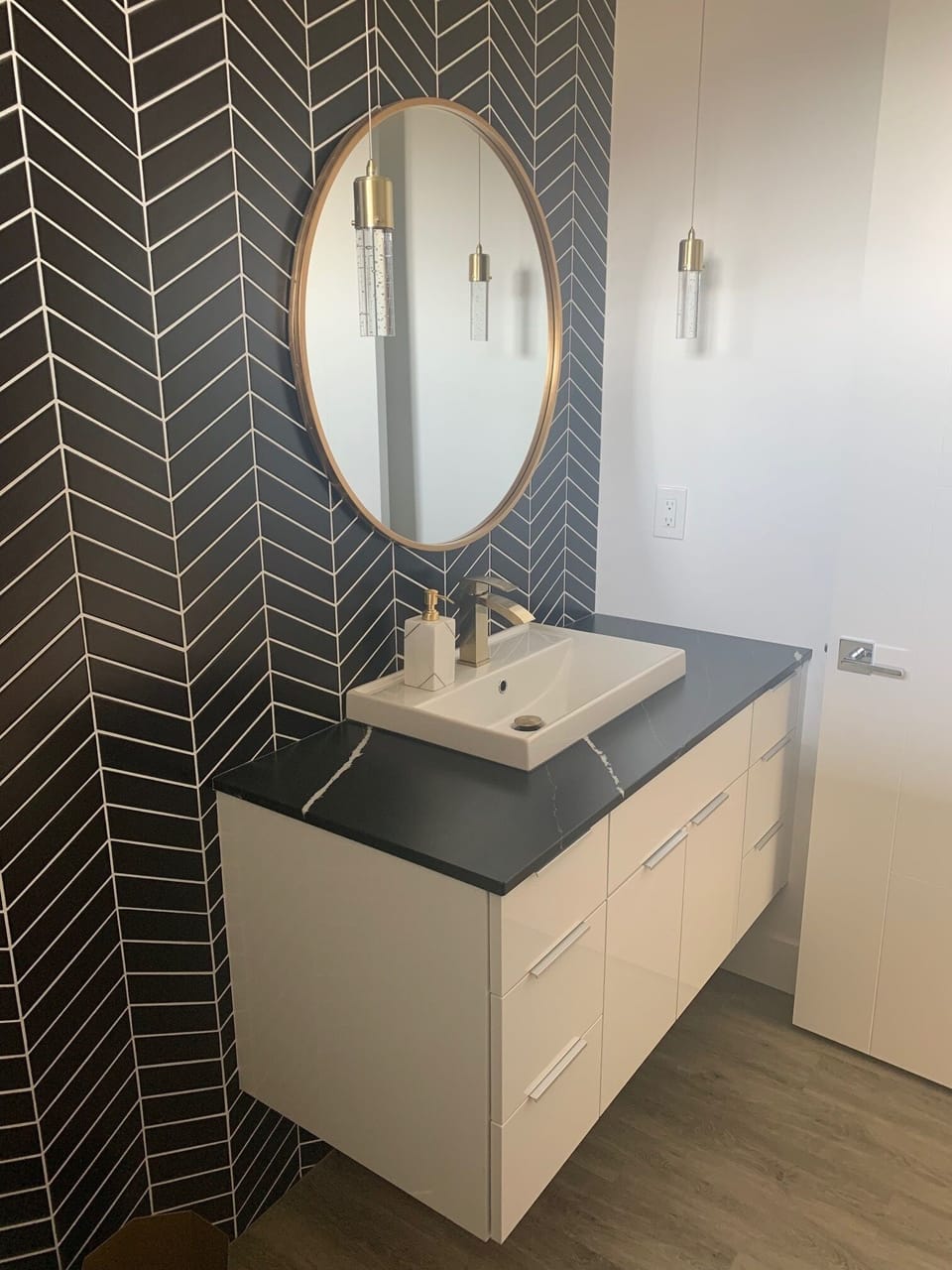 Powder room sink area. 