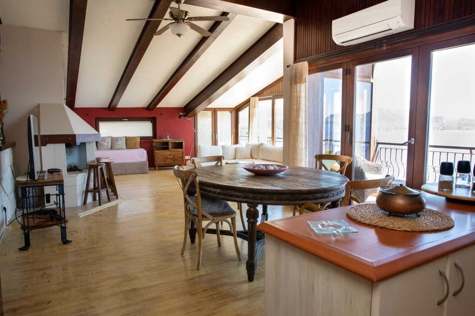 Panoramic Penthouse | Living area | Flat-screen TV
