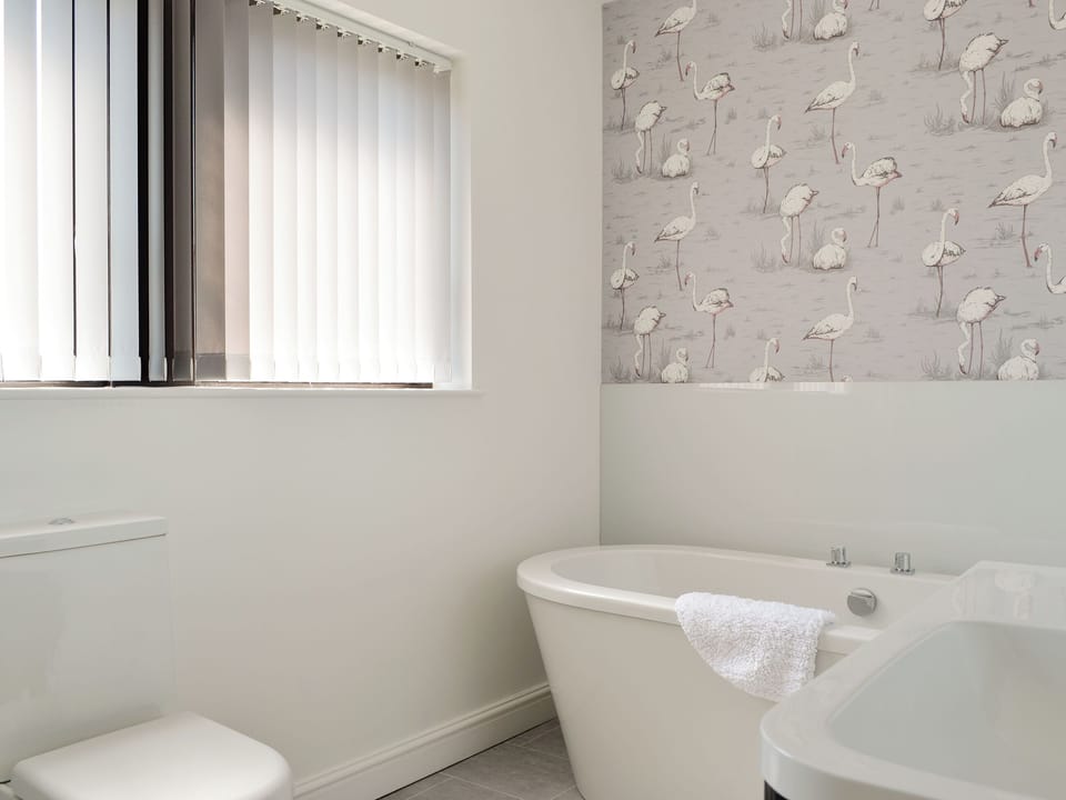 Family bathroom with bath and separate shower cubicle | Harbour Gates, Maryport