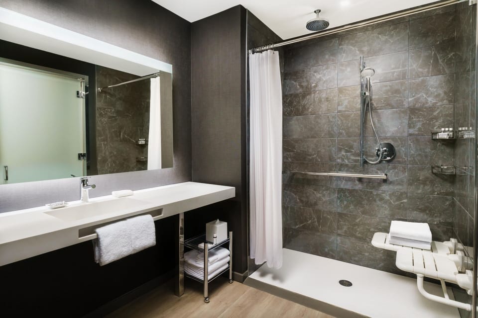 Hair dryer, towels, soap, shampoo
