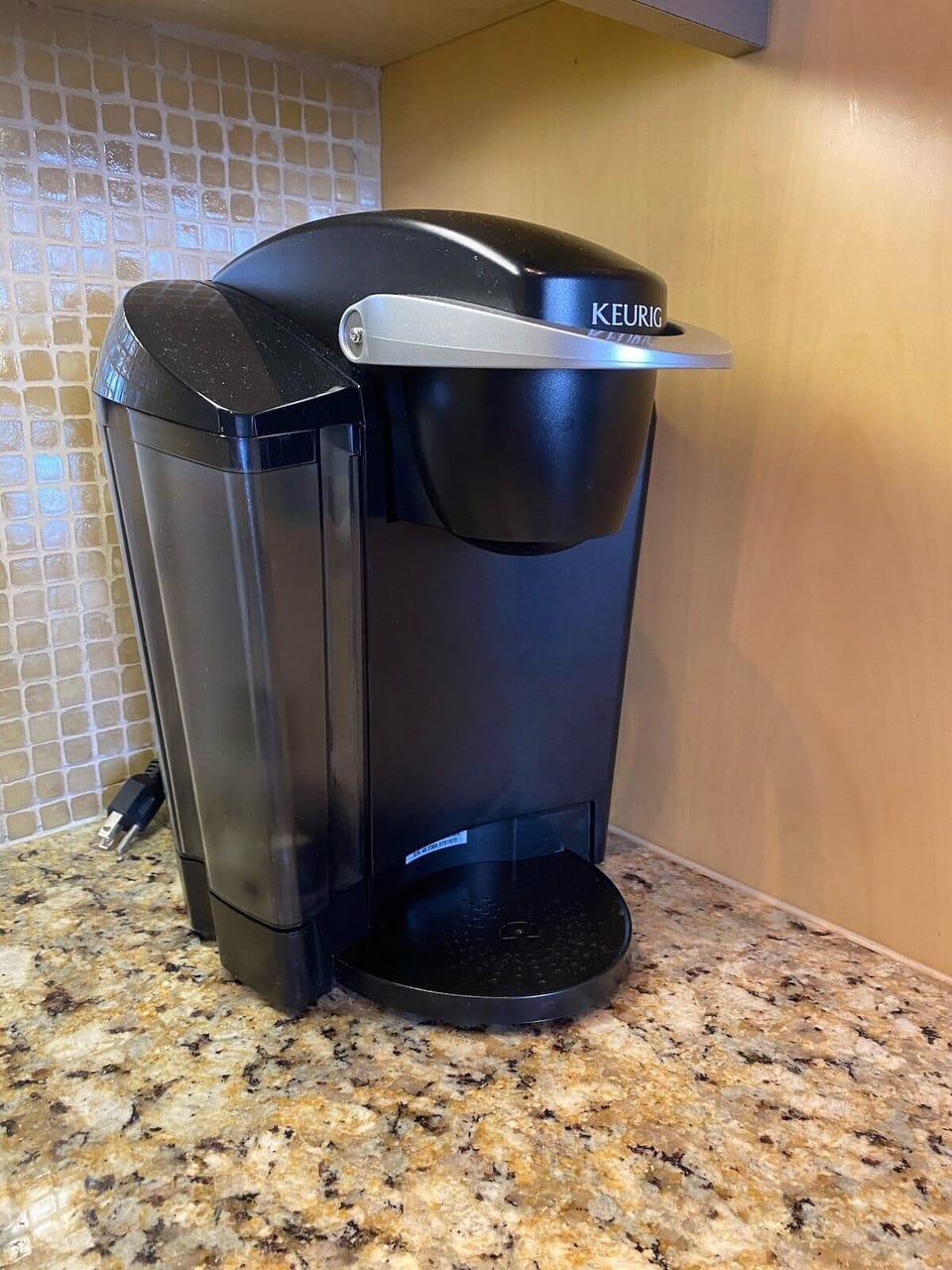 Keurig and regular coffee pot in unit