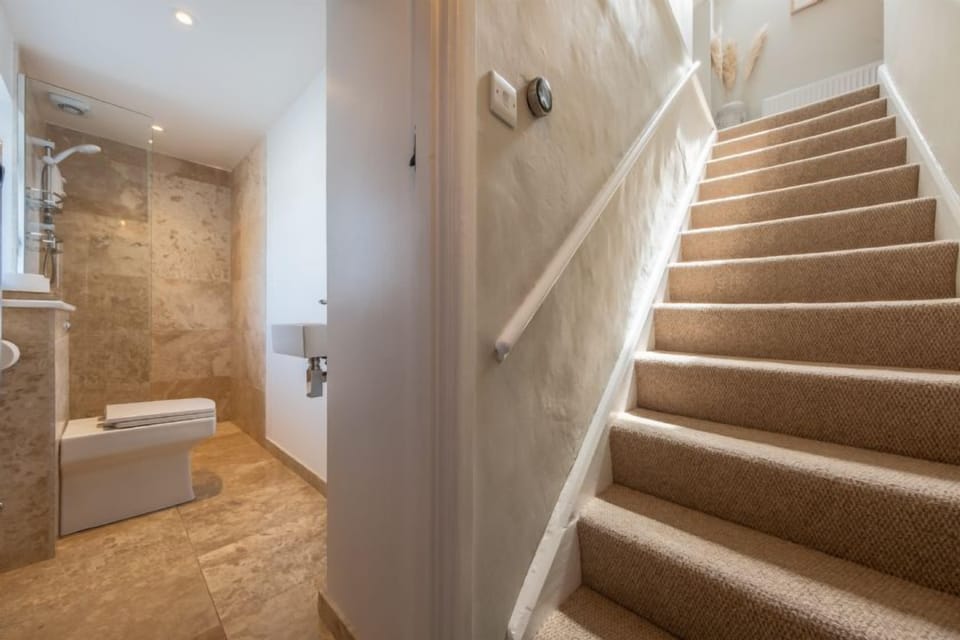 Ground floor: Showing stairs up to the first floor