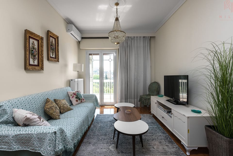 Apartment, 2 Bedrooms, Balcony, Sea View | Living area | Flat-screen TV