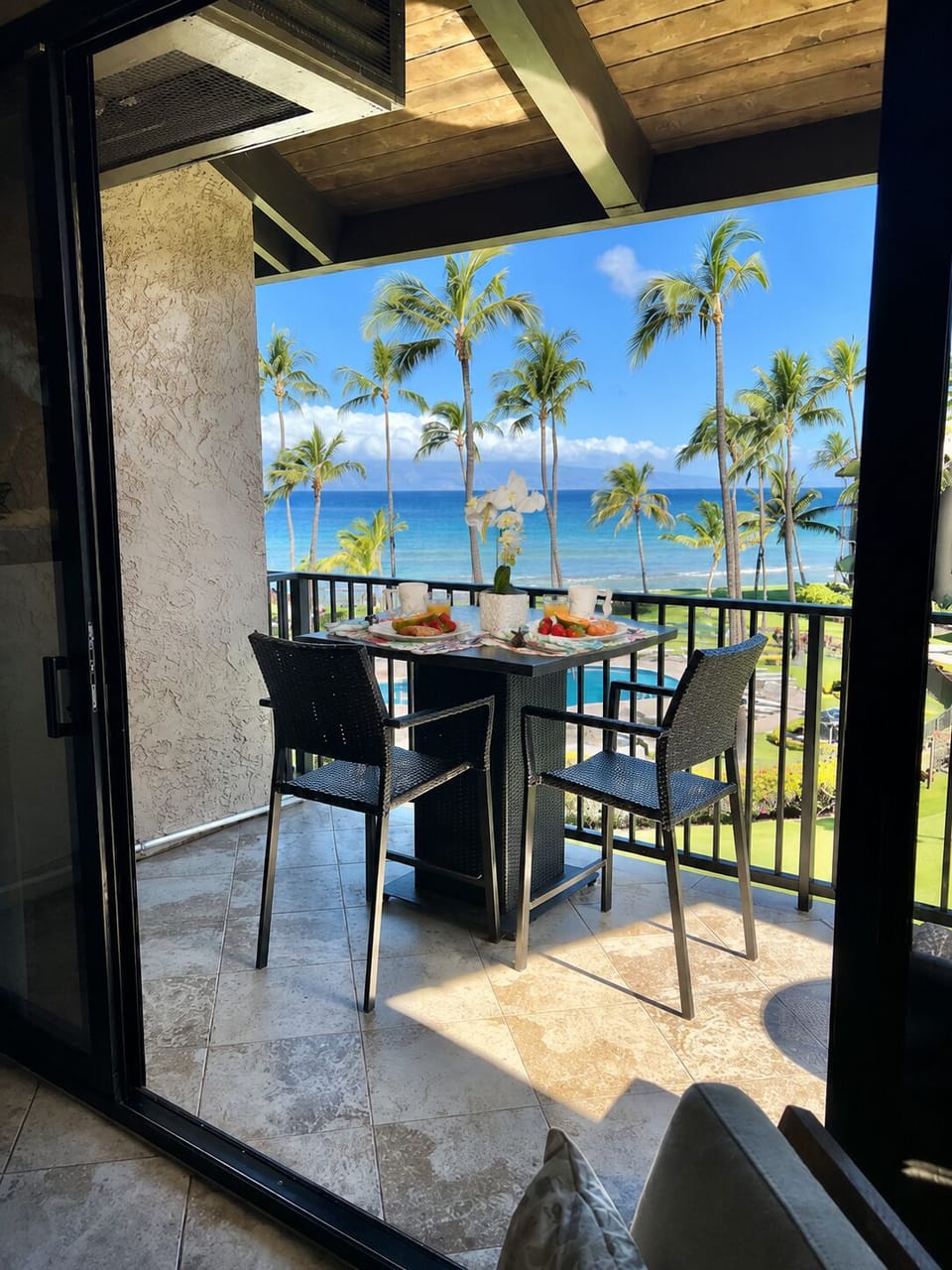Enjoy gorgeous ocean and mountain views from the lanai of our 4th floor unit.