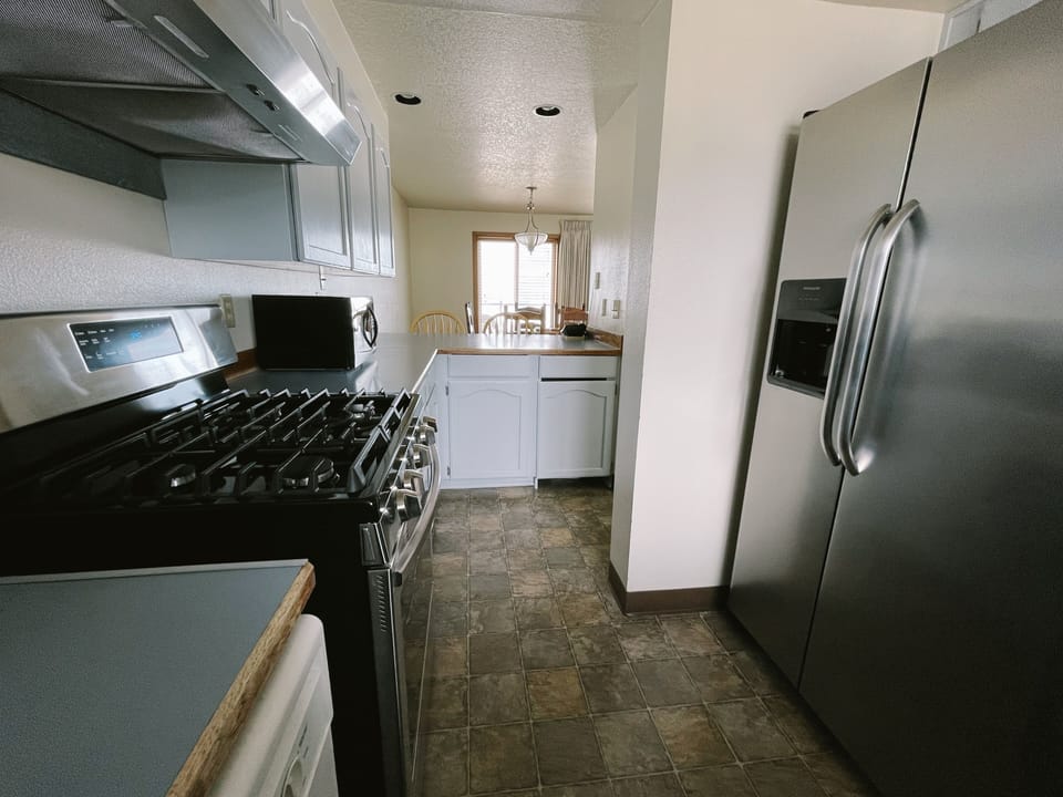 Family Room, 3 Bedrooms, Kitchen (First Floor) | Private kitchen | Microwave, coffee/tea maker