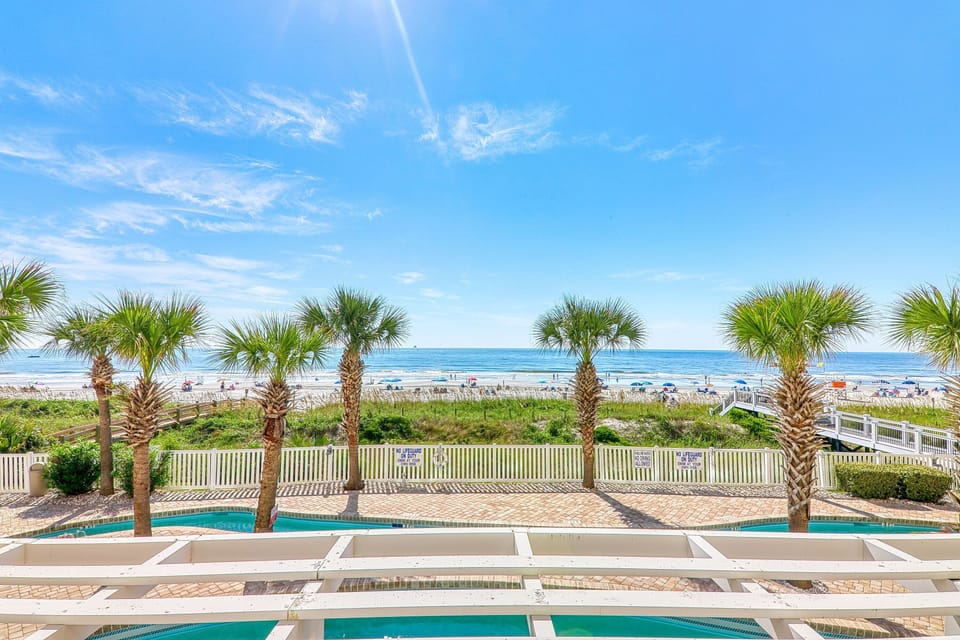 Relax under the blue skies and enjoy the surrounding greenery. 