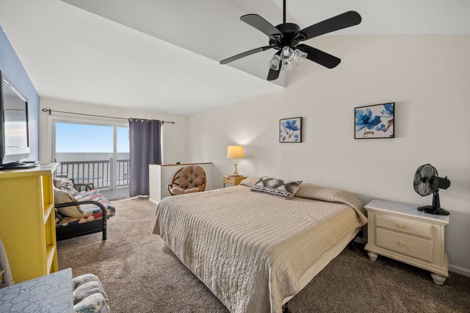Spacious bedroom provides room for you and the kids. Check out the balcony!