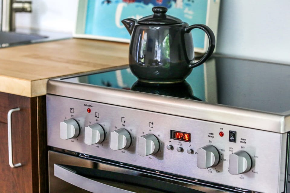 Superior Apartment | Private kitchen | Full-size fridge, microwave, oven, stovetop