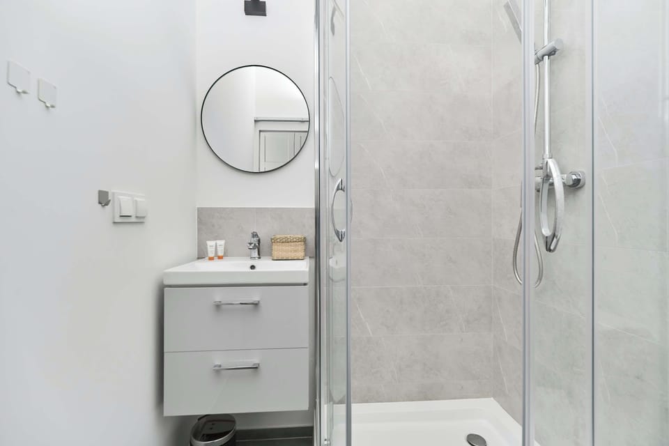 Bathroom with toiletries and towels. 