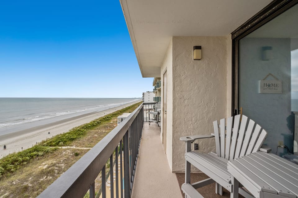 Sit outside and relax on this oceanfront balcony and listen to the waves.