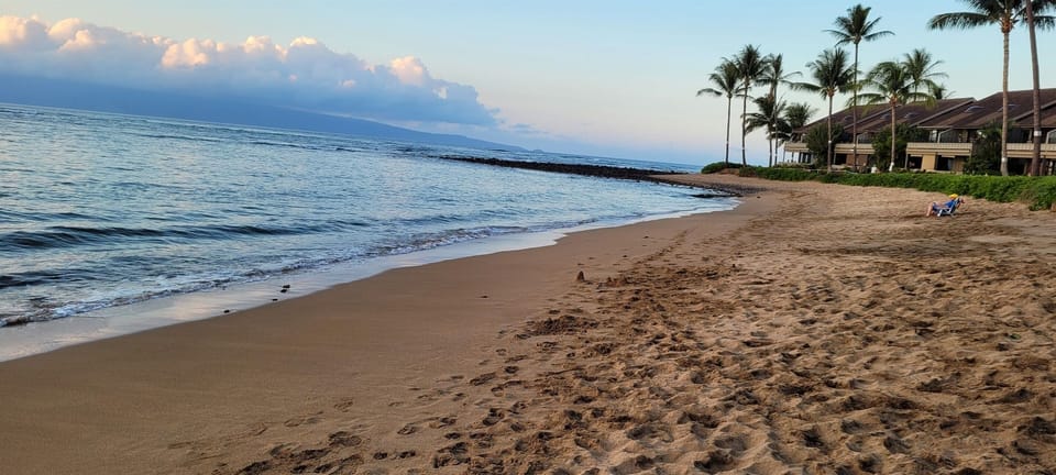 Secret Beach; only a 4 minute walk from the condo. Soft sand & gentle waves.