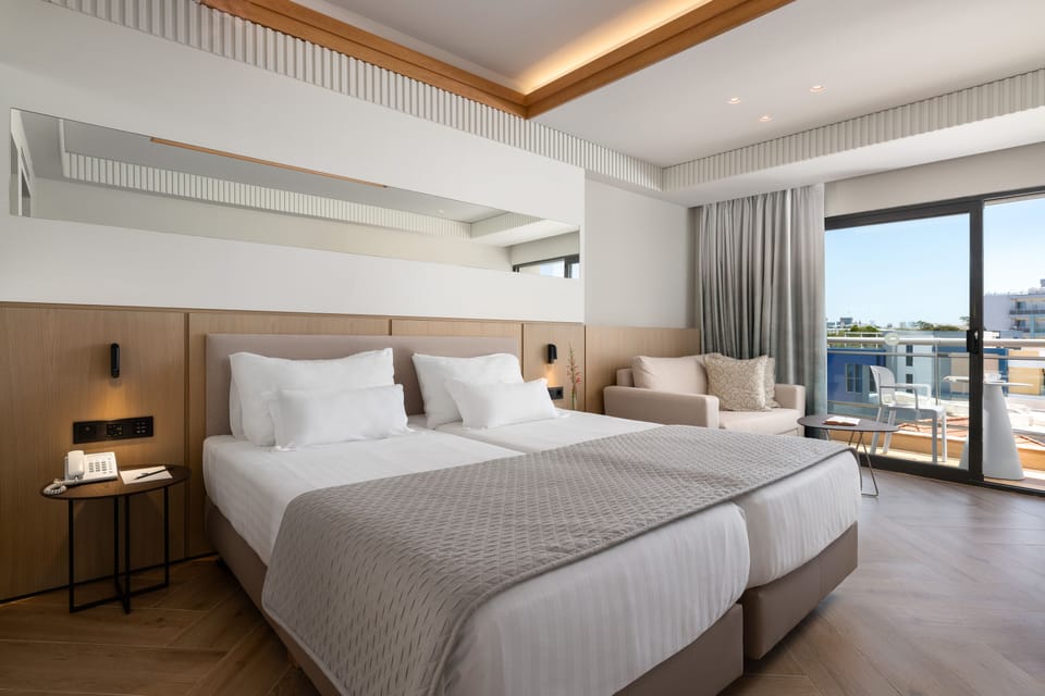 Double Room, City View | Hypo-allergenic bedding, minibar, in-room safe, desk