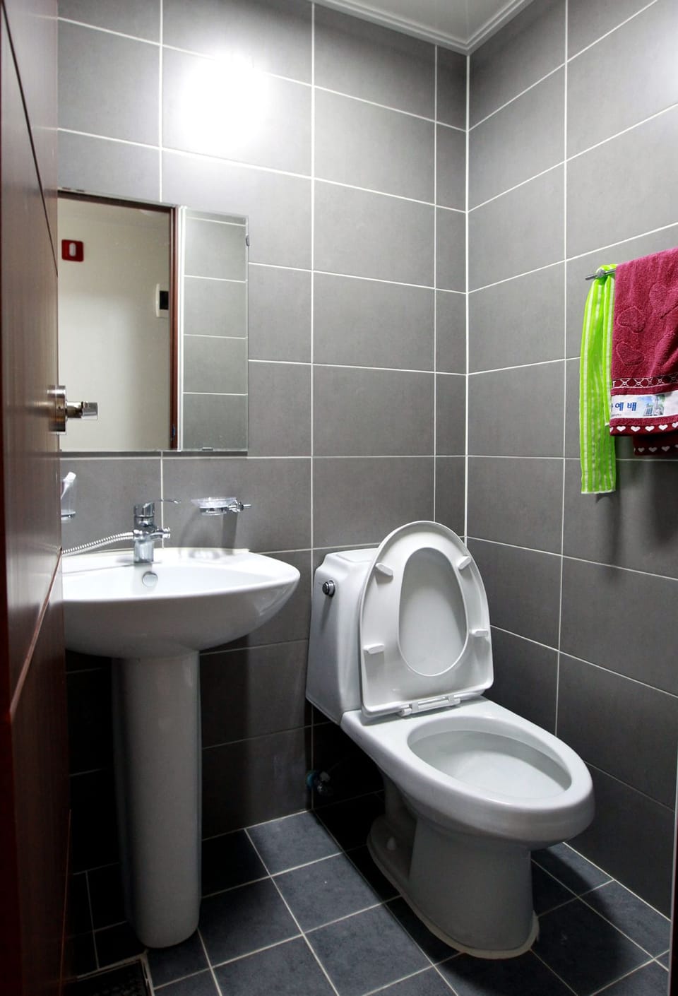 Shower, free toiletries, hair dryer, slippers